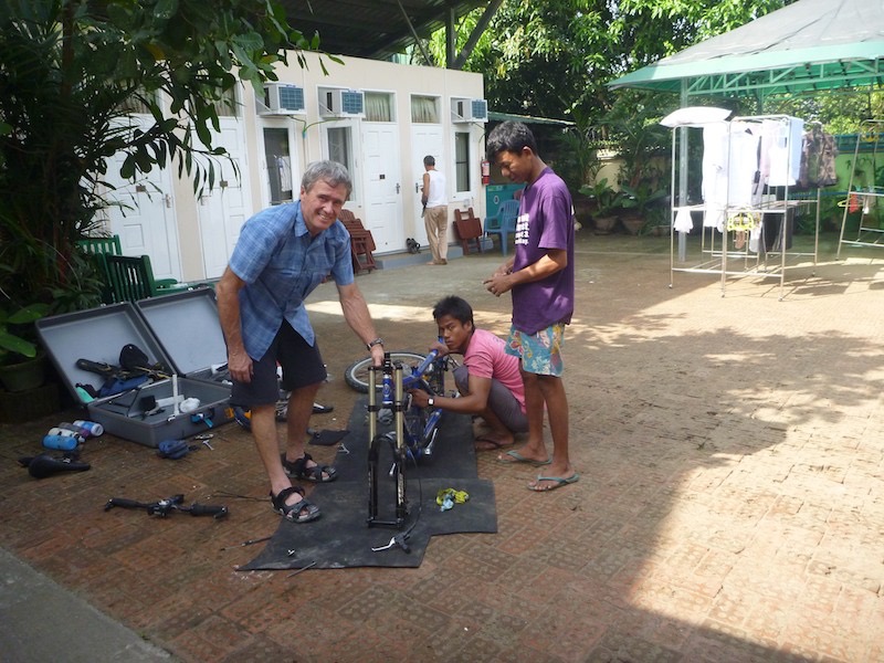 Putting the tandem together with help from the boys at Bike World